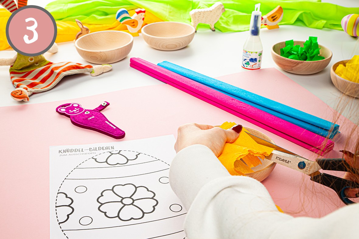 Schritt 3 Icon + Bild wie das Ei am gestrichelten Rand ausgeschnitten wird