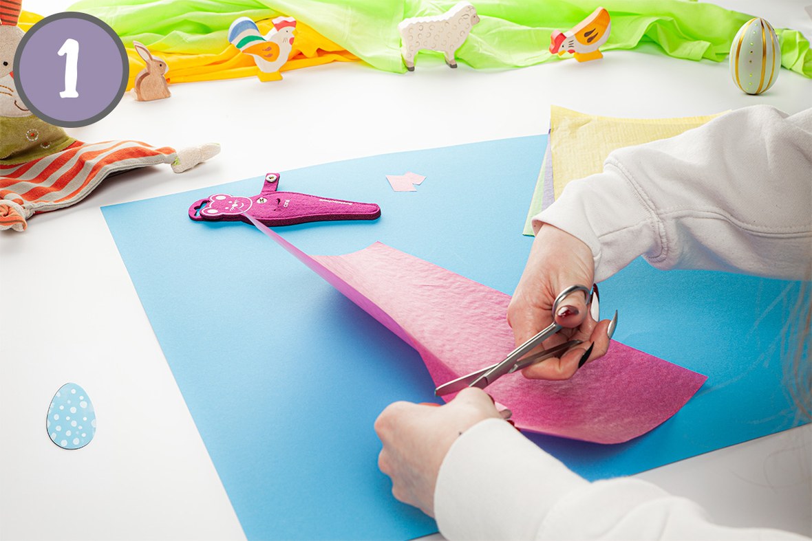 Schritt 1 Icon + Schneidet aus dem farbigen Transparentpapier kleine Schnipsel aus.