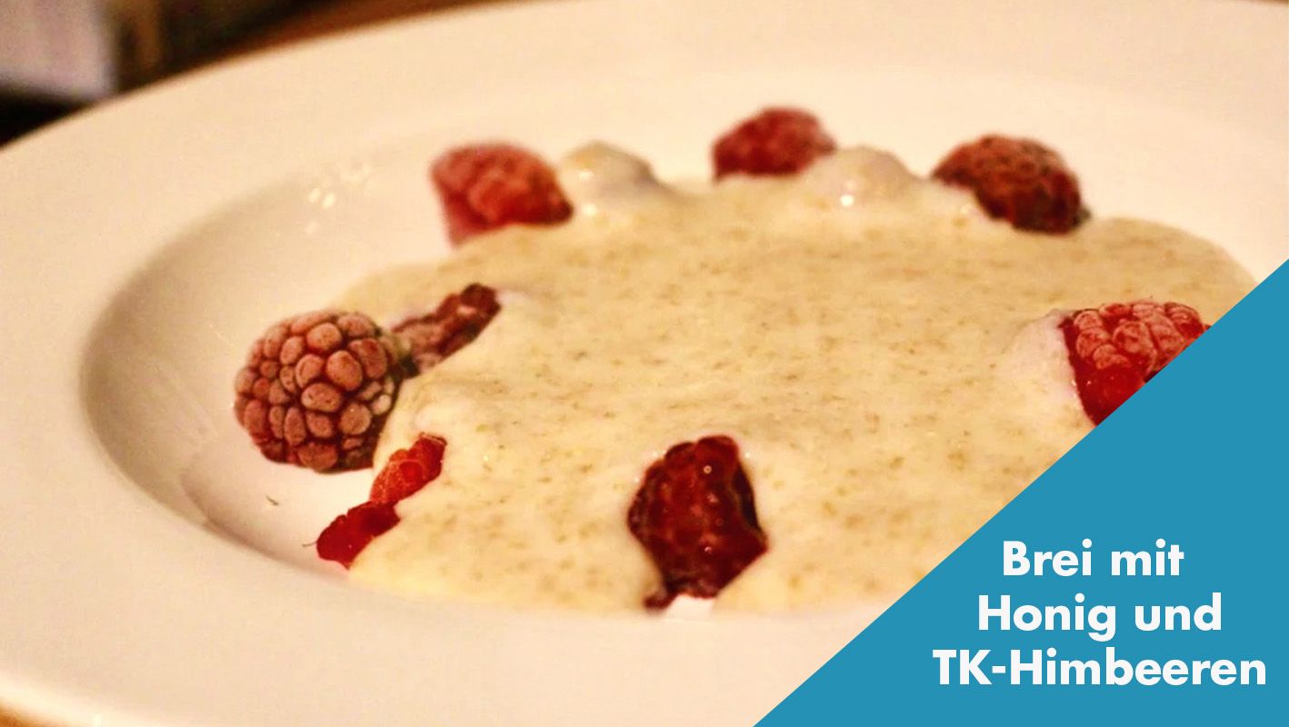 Getreidebrei mit Himbeeren
