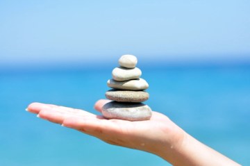 Zen stones hand