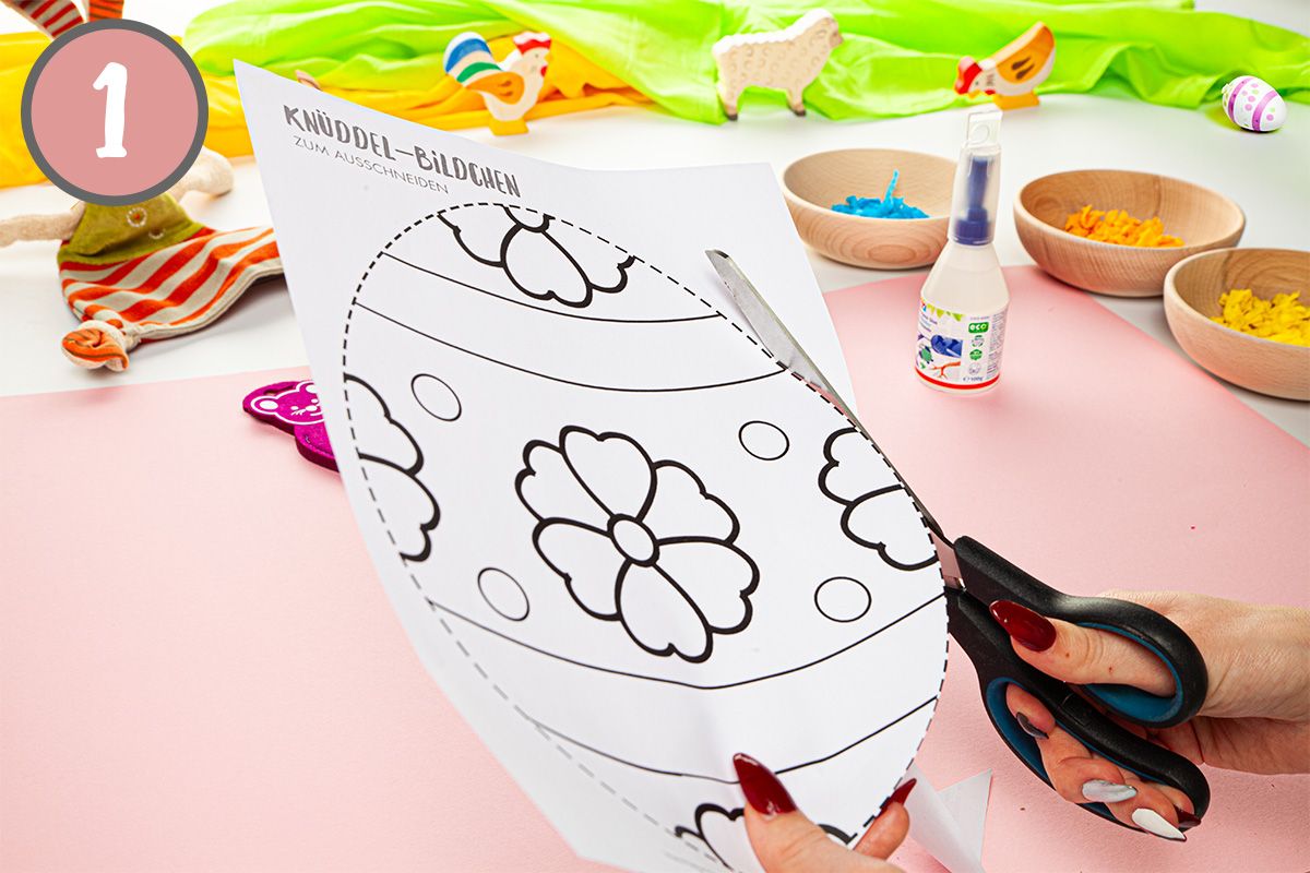 Schritt 1 Icon + Bild wie das Ei am gestrichelten Rand ausgeschnitten wird